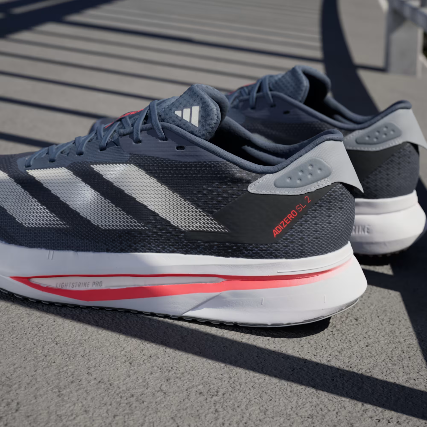 CORRIDA ADIZERO SL2 – METÁLICO Confortável